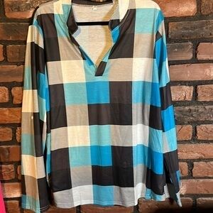 Great colors for this long sleeved, V- necked blouse!